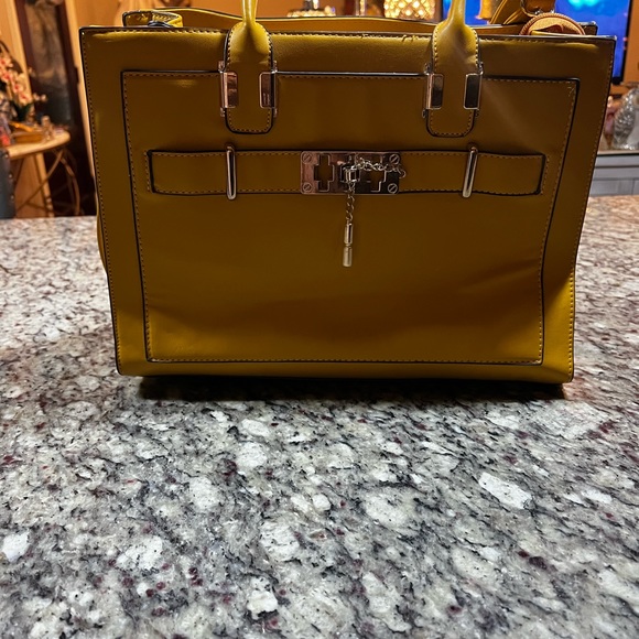 Gold hardware structured bag. - Picture 2 of 4